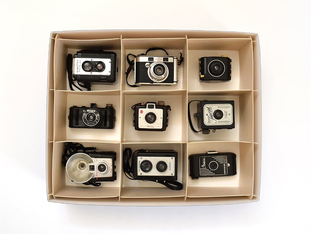 Archival Object Storage Kit with an acid-free box and dividers for preserving collectibles, heirlooms organized in compartments.